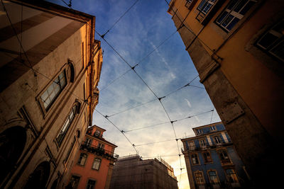 Low angle view of buildings against sky in city
