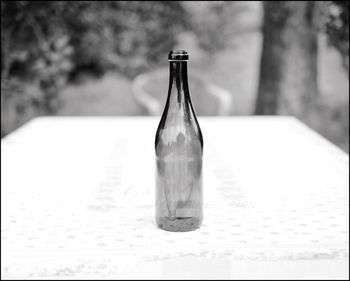 Close-up of beer bottle on table