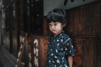 Thoughtful boy looking away