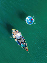 High angle view of people in sea