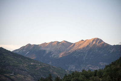 Scenic view of mountains against clear sky