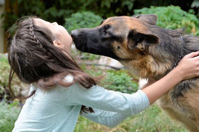 Close-up of dog sticking out tongue