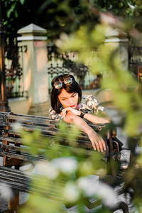 Portrait of young woman in sunglasses