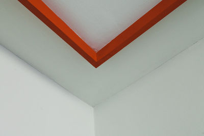 Low angle view of white wall