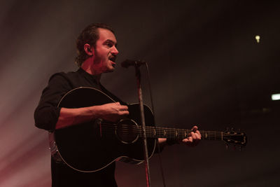 Young man playing guitar