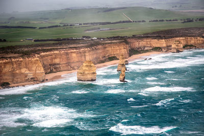 Scenic view of rock formation in sea