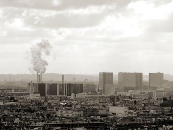 Buildings in city against sky