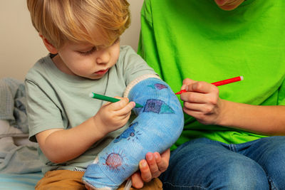 Close-up of girl drawing at clinic