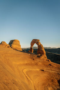 Scenic view of desert delicate arch at arches national park moab utah usa against clear sky