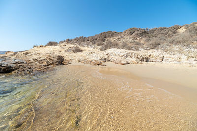 Scenic view of desert against clear sky