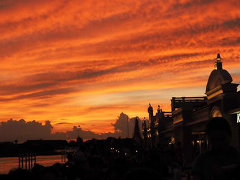 Silhouette of built structure at sunset