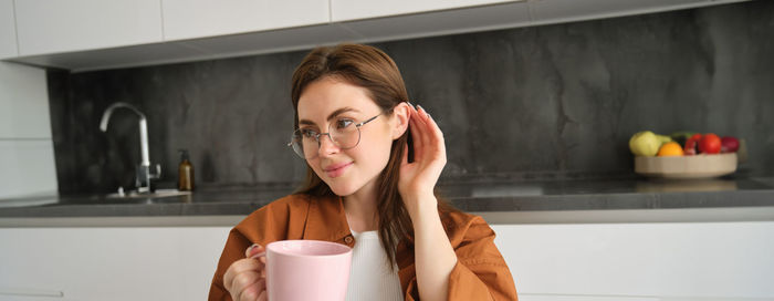 Young woman using mobile phone