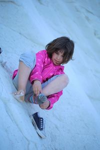 Cute girl playing on floor