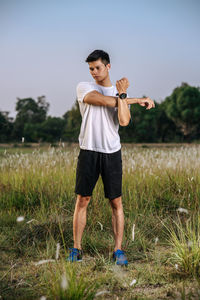 Full length of young man playing on field