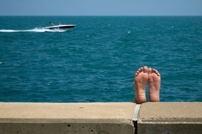 High angle view of man swimming in sea