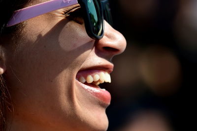 Close-up portrait of a smiling woman