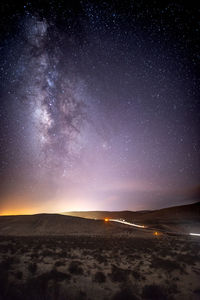 Scenic view of sea against sky at night