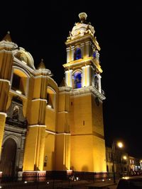 Low angle view of illuminated building