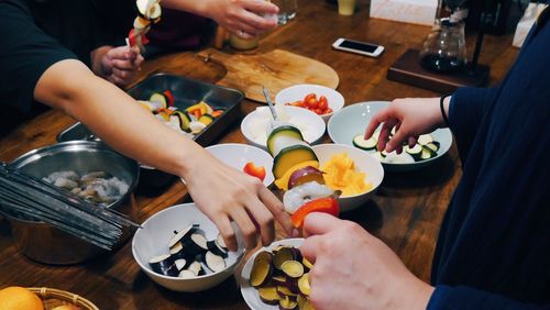 High angle view of people preparing food