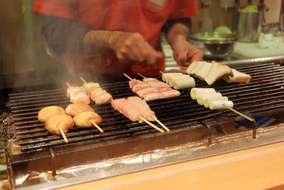 Close-up of meat on barbecue grill