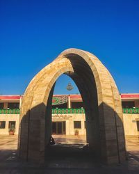 Exterior of historic building against clear blue sky