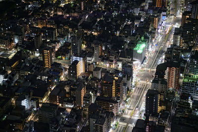 Aerial view of illuminated cityscape