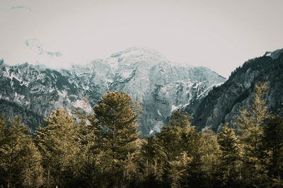 Scenic view of snowcapped mountains against clear sky