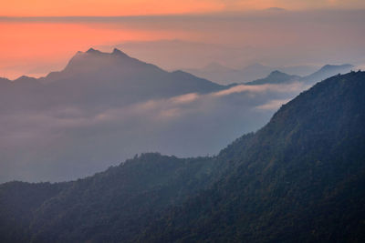 Scenic view of mountains against sky during sunset