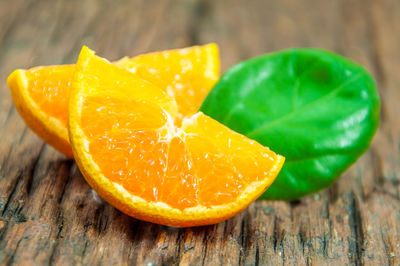 Close-up of orange on wood