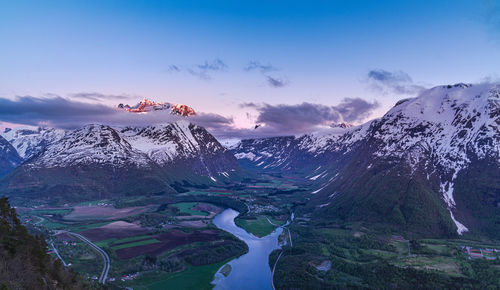 Scenic view of snowcapped mountains against sky