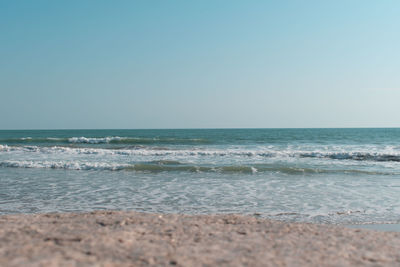 Scenic view of sea against clear sky