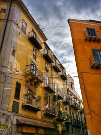 Low angle view of residential building against sky