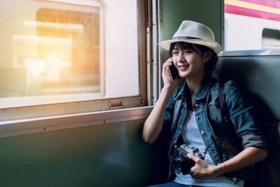 Young woman using mobile phone