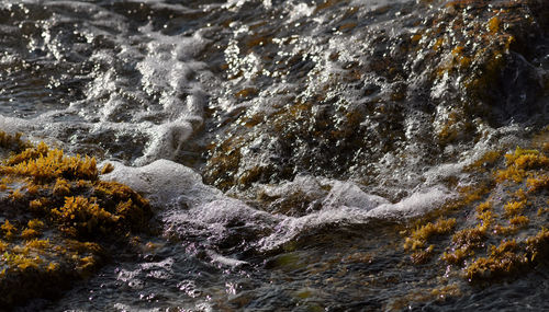 Waves splashing on rocks