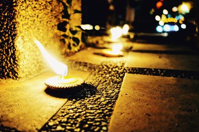 Close-up of illuminated candles