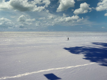 Scenic view of sea against sky during winter