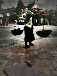 Woman standing in city