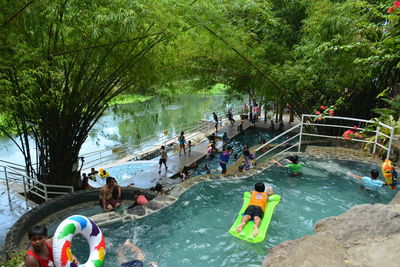 High angle view of people at swimming pool