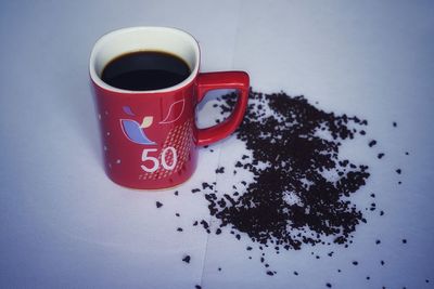 High angle view of coffee cup on table