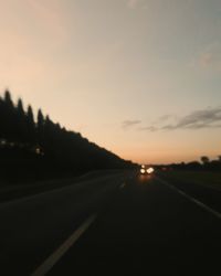 Road against sky during sunset