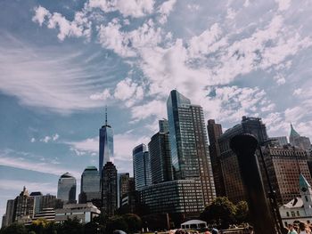 Modern buildings in city against sky