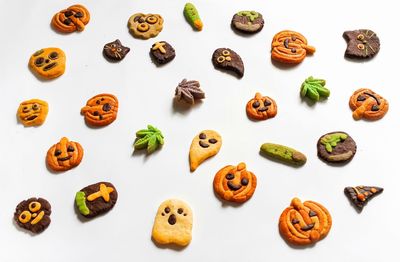 High angle view of cookies against white background