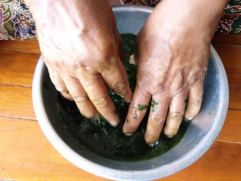 Close-up of person preparing food