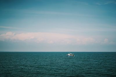 Scenic view of seascape against cloudy sky