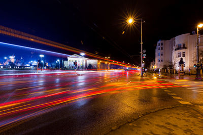 Light trails on city street at night