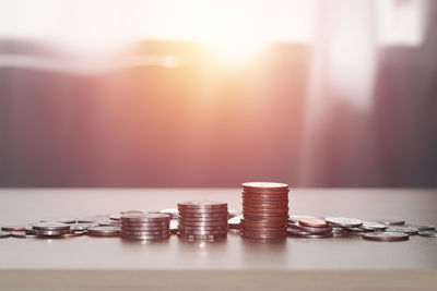 Close-up of coins on table