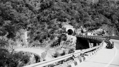 High angle view of people standing on footbridge