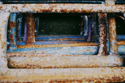 Top view of water through rusty pipes