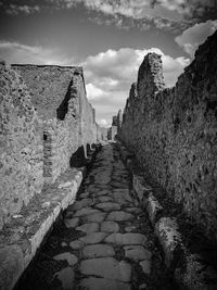 Walkway against sky