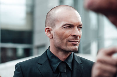 Portrait of man in suit smiling